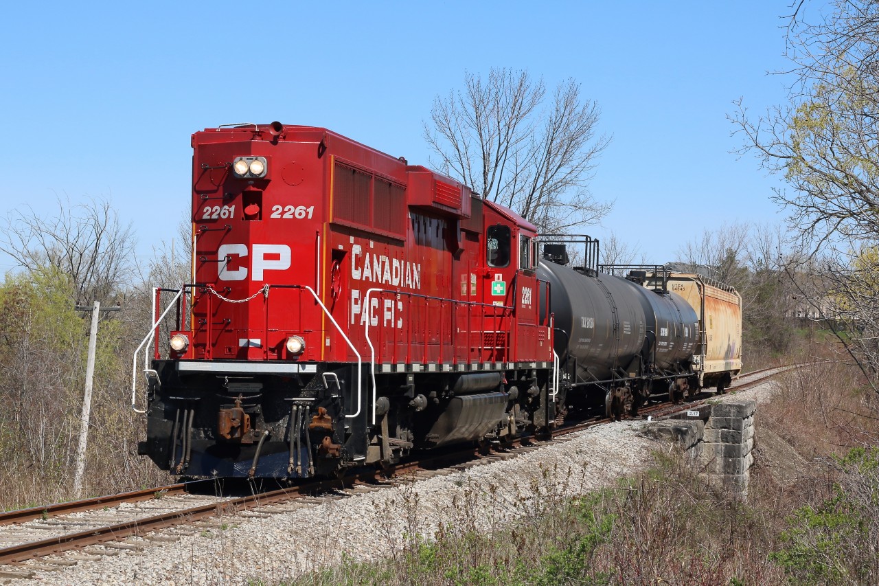 The OBRY is still waiting for replacement power as it's GP9RM is down with serious mechanical problems. For now borrowed Canadian Pacific GP20C 2261 is filling the void. It is seen on its last leg of its trip to Streetsville, passing mile 2 in Meadowvale.