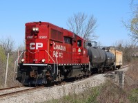 The OBRY is still waiting for replacement power as it's GP9RM is down with serious mechanical problems. For now borrowed Canadian Pacific GP20C 2261 is filling the void. It is seen on its last leg of its trip to Streetsville, passing mile 2 in Meadowvale. 