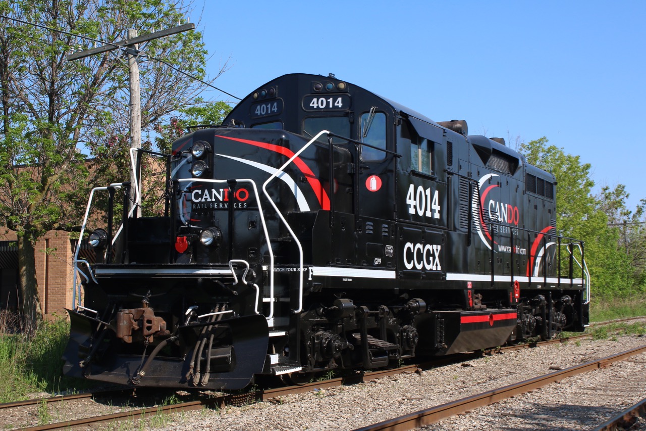 The new kids in town. Cando Contracting GP9RM 4014 was built as Canadian National 4001. It was last assigned to the Cando's Central Manitoba Railway and has now been sent to sister railroad Orangeville - Brampton Railway to fill in for ailing GP9RM 4009. The unit is waiting for it's Tuesday morning pick up by the twice a week road train from Orangeville. The arrival of this unit will allow the OBRY to return GP20C 2261back to CP.