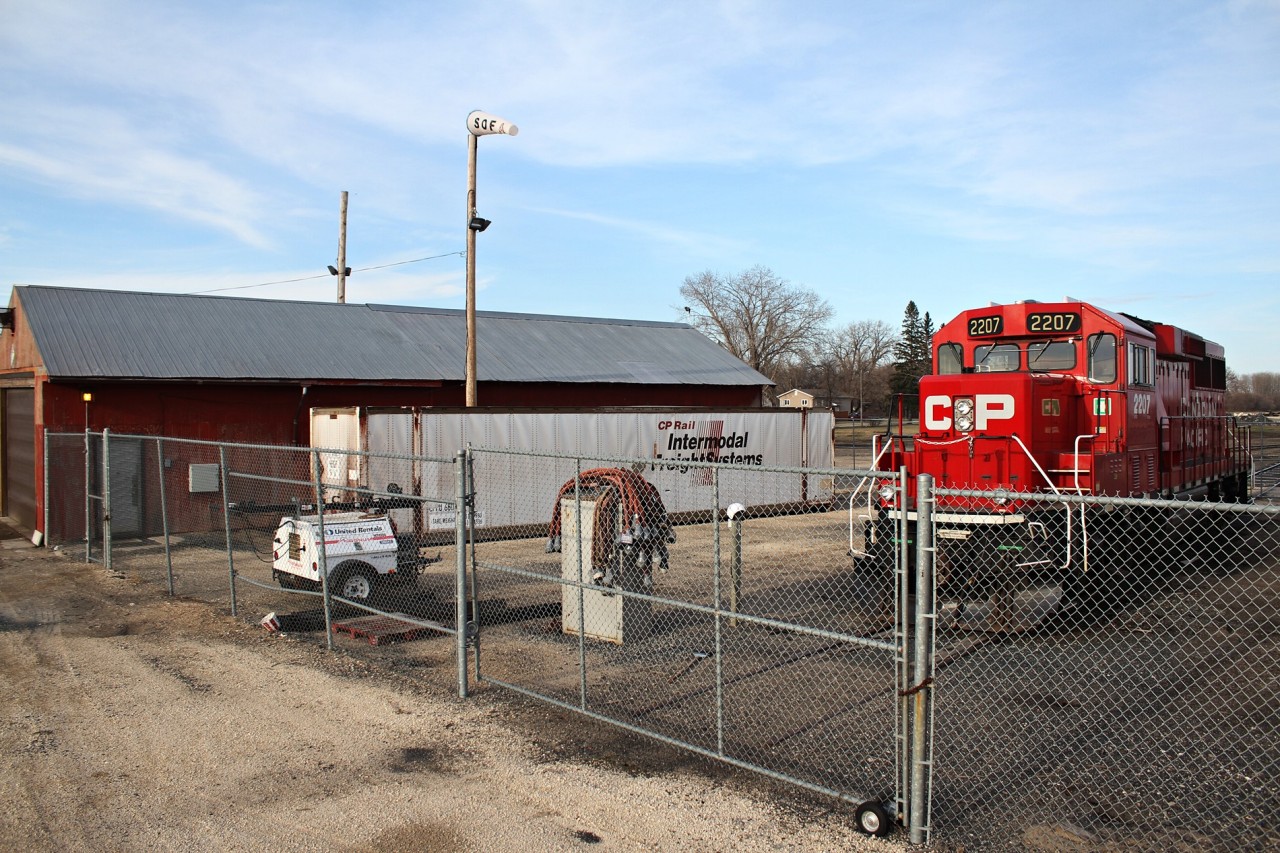 The Caged Beast. CP GP20EC0-C 2207 sits locked up in Portage La Prairie Manitoba as the lone unit in charge of working the various industries required on a daily basis one that regularly sees a Caboose/riding platform for the long shove to Simplot of a few miles west of the small Manitoba city.