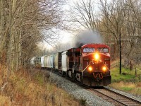 CP 254 with its 208 axels and 3575ft of mixed cars, led by CP 8607 with CP 8631, is working its way down the Galt sub headed to Hamilton leaving a steady plume of exhaust in its wake. 