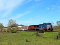 With what started off as a very overcast morning, the clouds were parting just nicely as CEFX 1020 leads CP 8527 up to MM 37 and Canyon Road just outside Campbellville