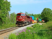 CP 9836 leads CP 9352 down the Hamilton Sub with its near 7600 foot container train as it crosses the 7th Concession at MM 68.9.