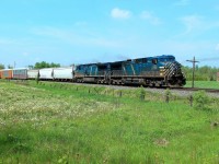  After crossing Victoria Road in Puslinch, a pair of blue birds in CEFX 1027 and CEFX 1031 round the bend and continue their way towards Guelph Junction on route to Hamilton.
