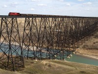 CP ES44AC 8919 is westbound on the bridge across the Oldman River in Lethbridge.