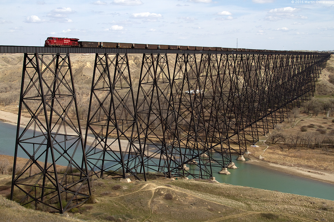 CP ES44AC 8919 is westbound on the bridge across the Oldman River in Lethbridge.