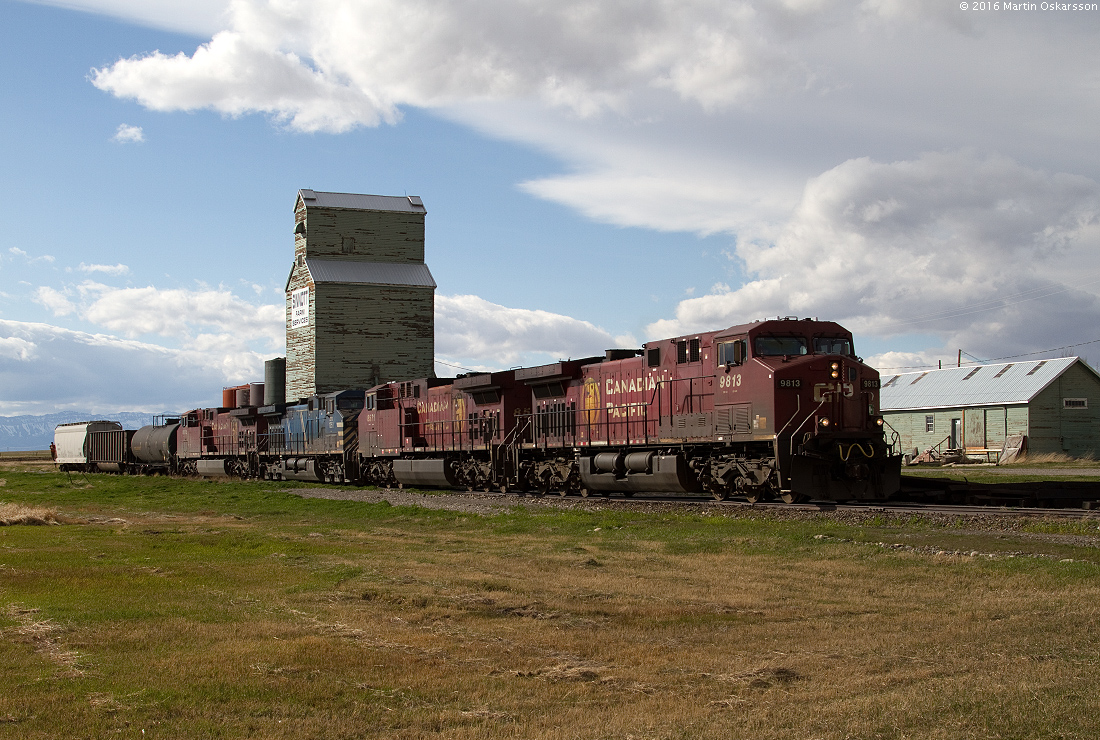 An eastbound freight train switching at Pincher station.