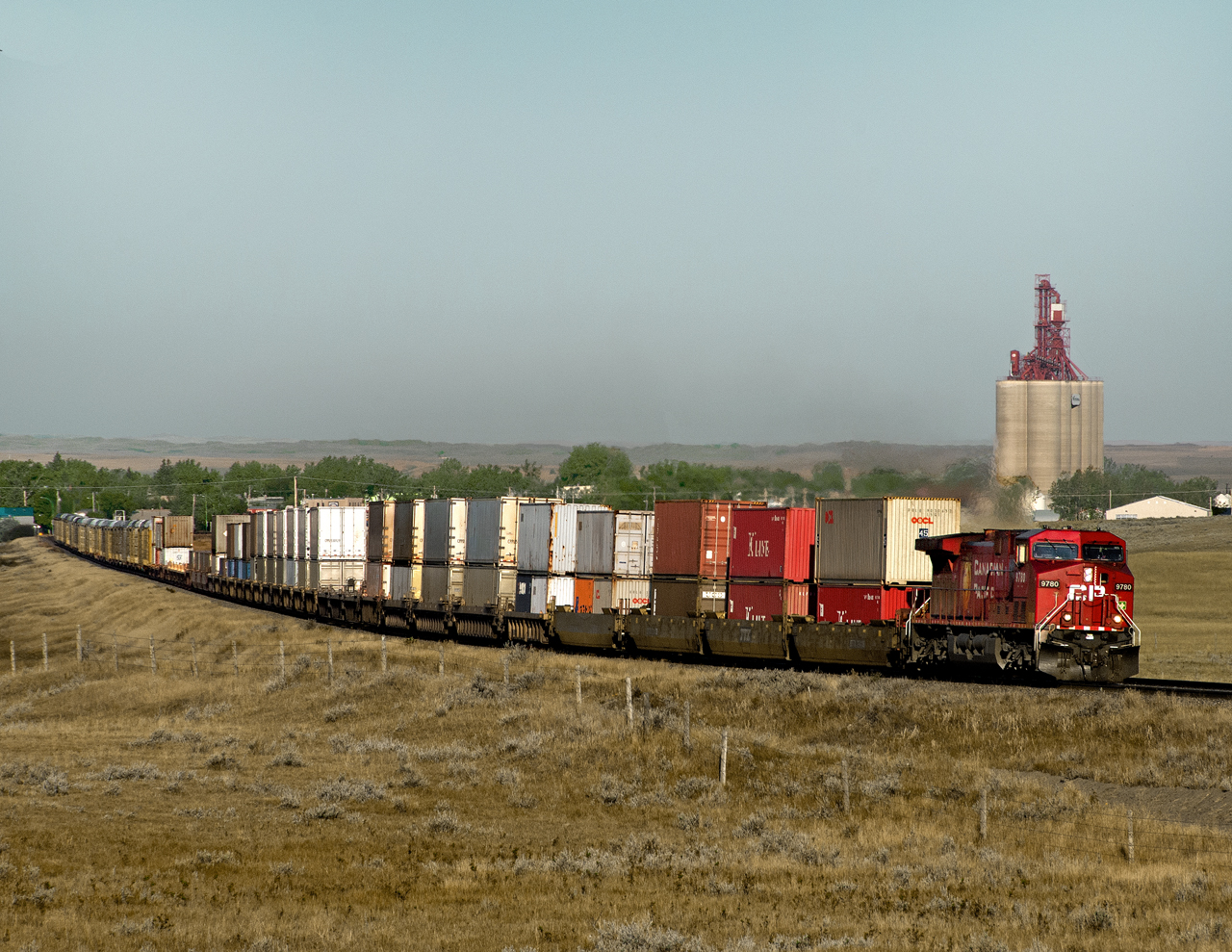 An eastbound intermodal curves out of Maple Creek on its run between Medicine Hat and Swift Current.