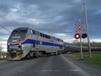 Amtrak 184 a P42 DC crossing Maricourt street in St-Hubert P.Q. going in Montréal by Rouses point sub AMTRAK route 68