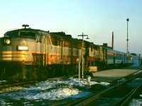 Some of the polish of earlier years seems to be lost as the northbound Canadian makes it's station stop at West Toronto. FPA-2 4097 and RS-10s 8571 with 5 cars make up #11 this March 12, 1972.