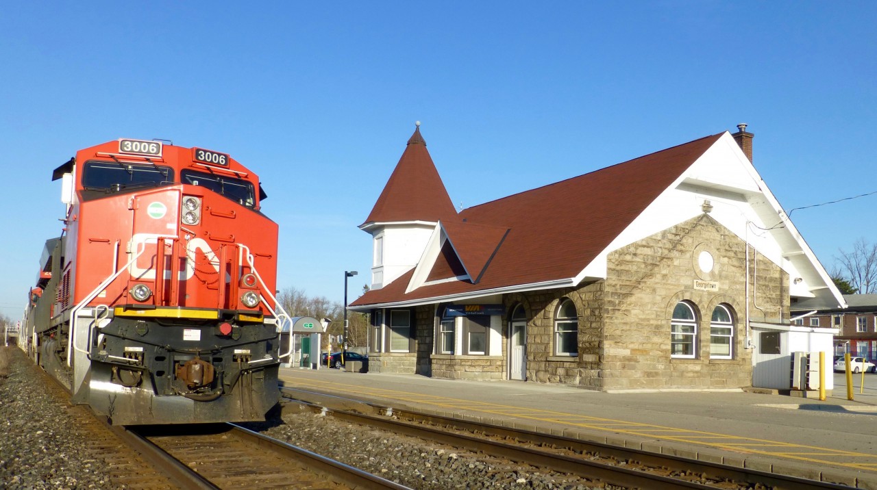 CN ET44AC 3003 passes by the Gorgetown VIA/GO station as it makes its way to Aldershot, Ont to make a set off and lift. Trailing 3003 is CN ES44AC 2819 and 13,000 tons of traffic for Aldershot.