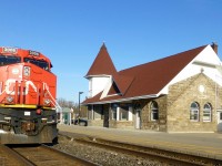 CN ET44AC 3003 passes by the Gorgetown VIA/GO station as it makes its way to Aldershot, Ont to make a set off and lift. Trailing 3003 is CN ES44AC 2819 and 13,000 tons of traffic for Aldershot.