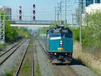 VIA #84 lead by F40PH-2d 6454 has just left Brampton VIA/GO station as it moves by Peel on CN's Halton Sub on its way to Toronto Union Station.