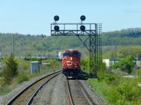 CN 422 lead by ES44DC 2247 charges uphill as it makes its way by the "Milton Hilton" at Milbase on CN's Halton Sub. 422 was over 11,000ft departing Aldershot. Next stop. Mac Yrd.