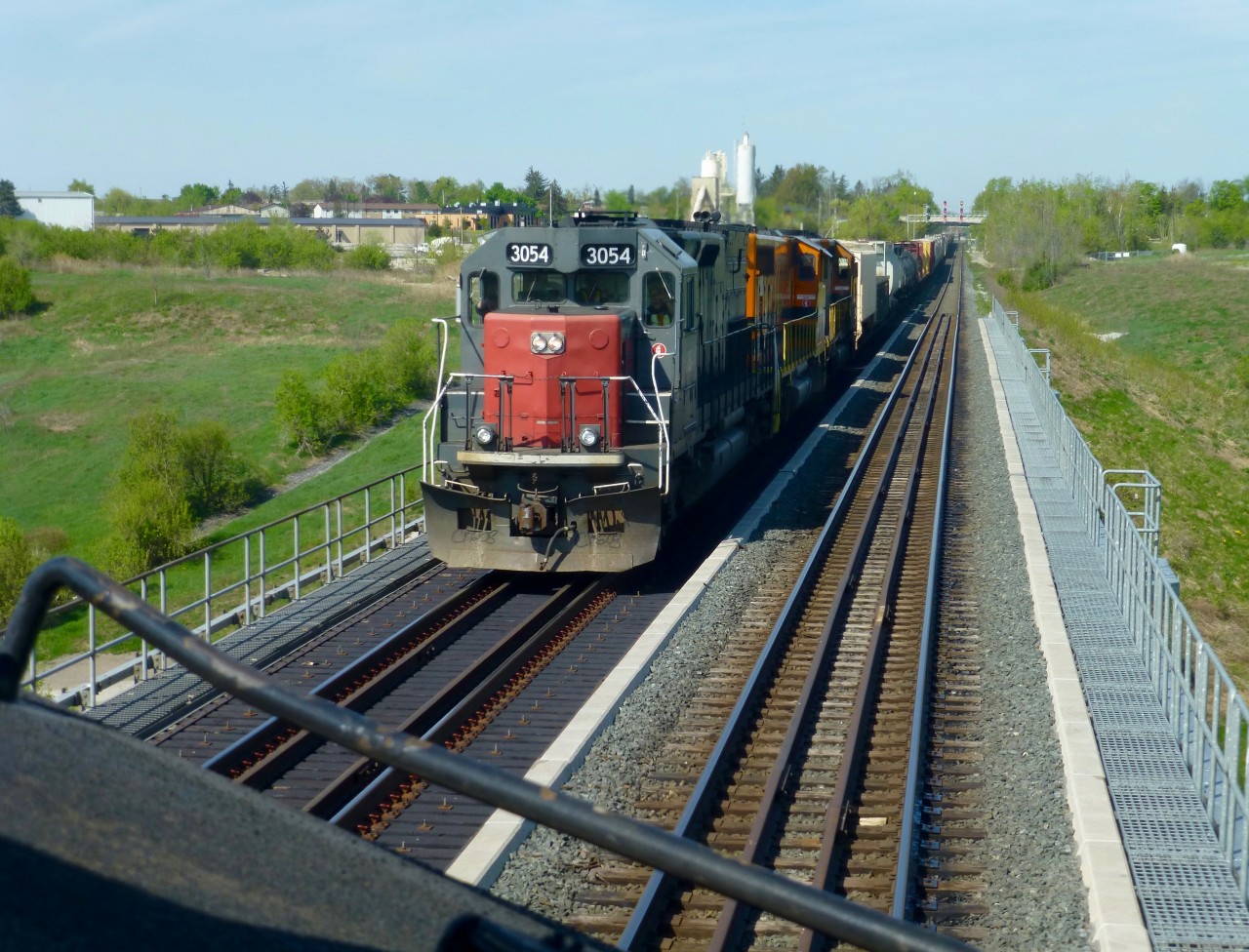 GEXR SD45-T2 3054 ex SSW 9392 crosses the Credit River near Georgetown after taking CN tracks at Silver on its way to Mac Yard.
