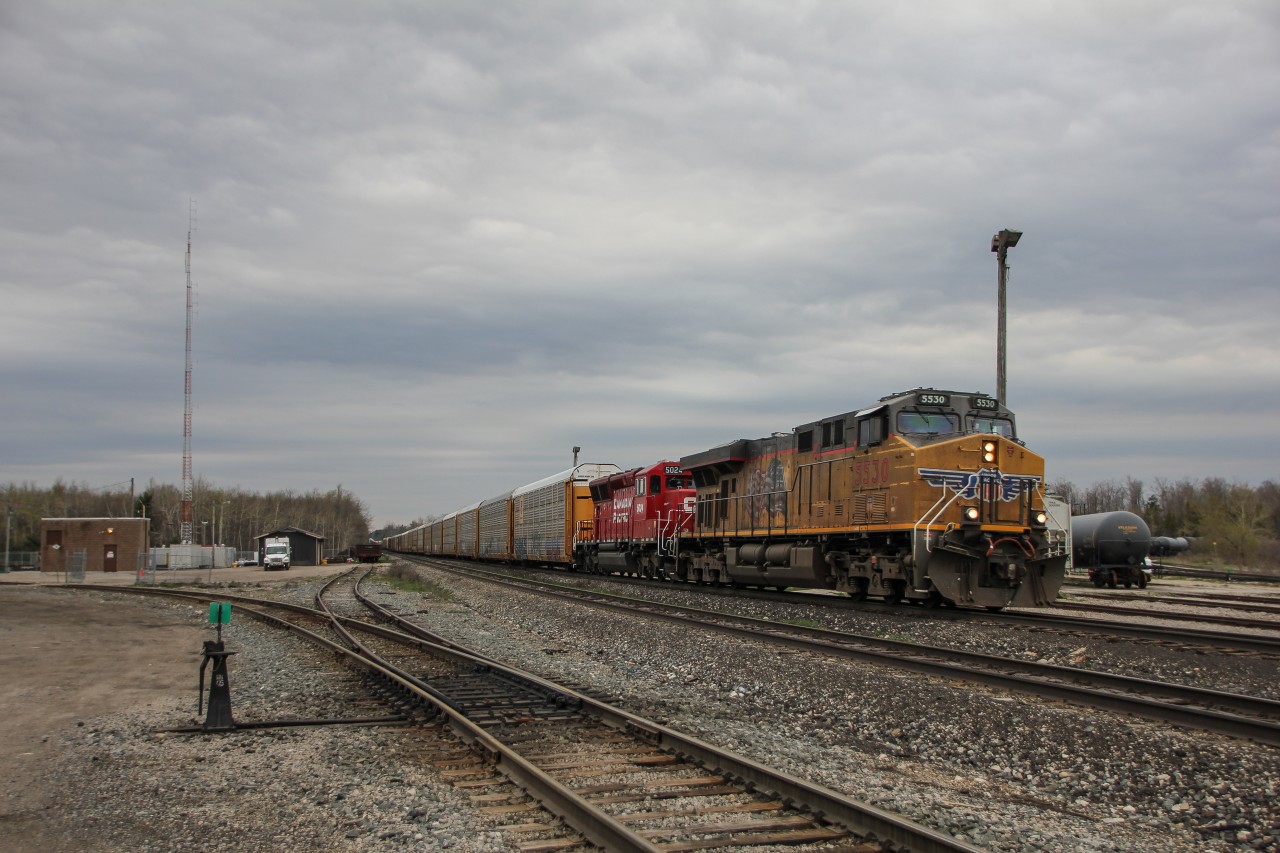 2-234 flies through begin/end CTC sign Guelph Junction, with a very dirty UP GEVO leading my first CP SD30ECO I've ever seen. Pretty cool to see, but I'll take an SD40-2 any day.
