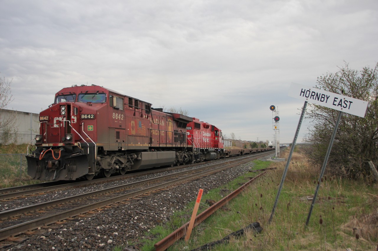 132 departs Hornby Expressway Terminal, after putting on a smoke show minutes earlier, going back and forth into the yard. Notice 8642s flags on the side? I guess that is more rare than FPON on CP nowadays.