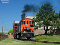 And the reason you photograph MLW's? Smoke... plenty of it! Trry 108 chugs in a typical MLW groan while the crew lift 2 boxcars from WP Warebousing in St. Catharines. You can see the chugs of exhaust from the 1000 horsepower, inline 6 cylinder 251c engine in the plume. I also find the fresh and clean CN inspired cab paint pleasing - this engine is well taken care of by Trillium's crew.<br><br>Some folks have mentioned the former Interlake paper plant - which I've shot but never with a train - where are their boxcars going for transload? Is this warehousing company involved? <br><br>See the other two previous shots in this series by clicking on 'more' beside my name. Photo notes: Most photos in this series employed use of a polarizer filter.