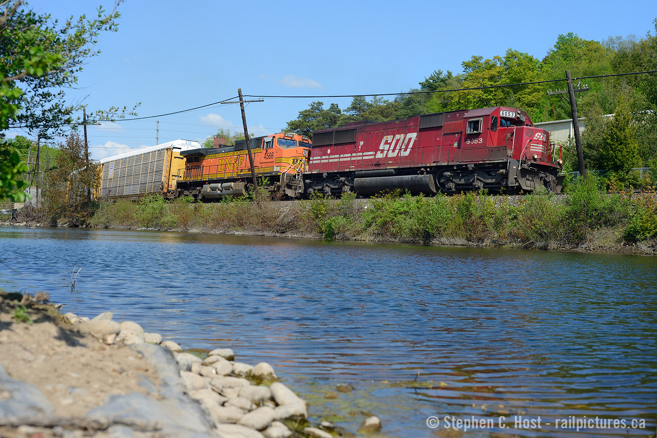 When the SD60 rebuild program was cancelled, I actually sighed a breath of relief. Shots like this would have become extinct, since all SOO sd60's would have been repainted CP by 2013. And thankfully a few of each SOO paint type survive. Campbellville is a pretty town, however 10 years ago this shot was grown in really badly... only in recent years has it become shootable again, but as you can see the vegetation grows quick.. and if you look back at  Bill Thomson's (1)  many shots (2)  from the pond, it's been an issue over the last few decades. So thanks to  Kevin Flood's inspiration on his shot of SOO 6053 east   the other day  I made the trek to the pond for 147 for my one and only photo for the day. Worth the trip!