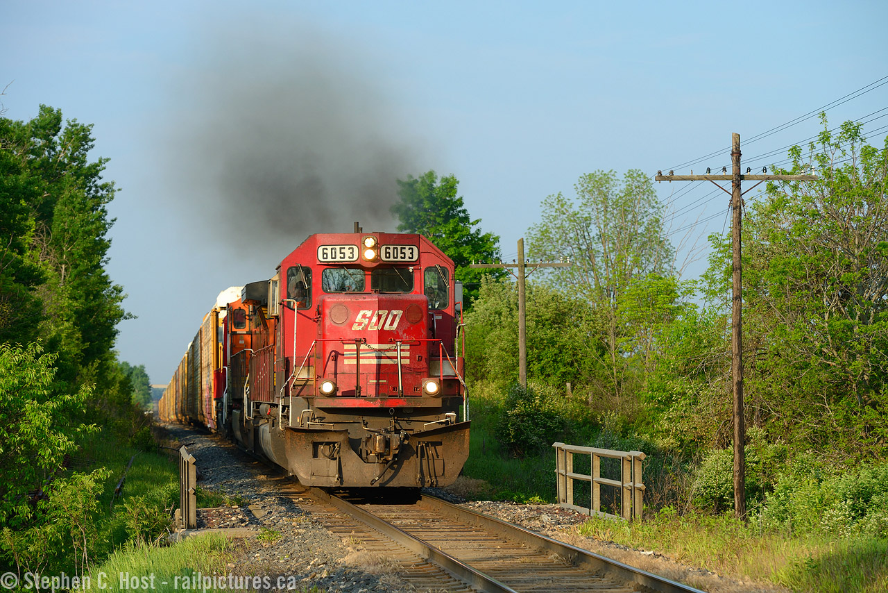 Black smoke, beautiful light, a nice leader, the melodic sound of groaning power accelerating to speed.. which would have been more than enough - then the hogger pours on the SOO P3 horn as they blow for Victoria Rd? ............ melting. Oh boy. Greg Smith and I all smiles after that encounter :) Here's the visual.... where's a video guy with you need one???
