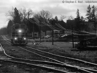 A lone engine heads North on the former CNR Fergus subdivision, once a mainline like any other but now a rickety shadow of itself. Evidence of its mainline past gleams in the morning winter sun - the siding once used to meet trains, and the codeline used to dispatch and communicate to agents and dispatchers to the North and South. 