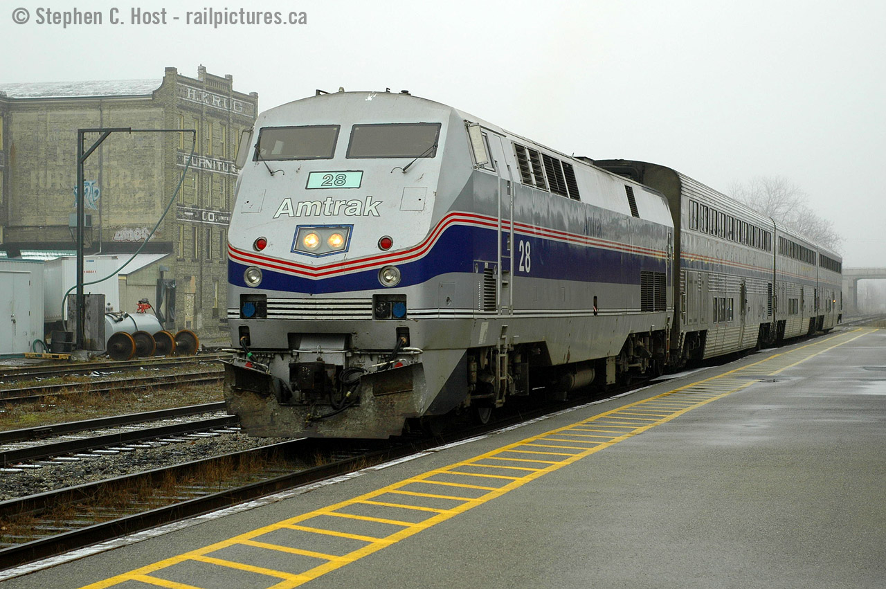 Heritage? What's that? - while a number of people foam over the "heritage" Amtrak 184 and it's scheme matching the amfleet cars, I shake my head - this happened on a nearly daily basis with numerous Amtrak paint schemes.. the only scheme we did not get was "pepsi can" paint which was already eradicated. This wasn't very long ago, guys... :) For the un-initiated, this is the VIA/Amtrak International which was a morning westbound run, and was cut back to Sarnia with a schedule change in April 23 2004, eliminating Amtrak on the Guelph and Strathroy subs..