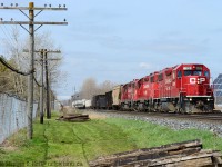 T69 goes about their business switching in the backtrack at Zorra siding. Moment later is when a farmer would rip off the crossing gate.

