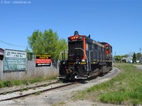 A railway I haven't shot in about 13 years - so I have many holes in my St. Catharine's map to fill. I finally made it out to see Trillium in action on what turned out to be a beautiful spring day.  Many of our contributors have shot this line: in the shadow of THE Mooney (all his wonderful CN shots on former NS&T!) and Dr. Pinklaces (Martin Irving's recurring works) plus <a href=http://www.railpictures.ca/searchresults?query=Trillium+Railway+-imagesize:200x150+-imagesize:930x170+-imagesize:728x90+-imagesize:720x90+-imagesize16x16+-imagesize:200x130+-imagesize:200x133+-imagesize:200x136+-imagesize:200x151+-imagesize:200x132 target=_blank> many others</a>. I don't know why it took me so long - believe me I tried too, even tried to shoot the Townline spur one day in 2005... failed. Without further ado.. <br><br><b>What can go wrong with a MLW S13, sunshine, and St. Catharine's ex NS&ST track? Nothing!</b> Really, it only gets better from here! And special thanks to the crew - professionals through and through, you can really see the 'style' some crews use to get the job done and these guys were thorough yet incredibly efficient.  In this shot, 108 is rounding to the Townline spur at Steve Ratkovsky & Son's where to my left the Ratkovsky's were making a pile of chopped wood in some old fashioned way. (too bad they don't use rail service!). Such neat track in the north end of St. Catharines.