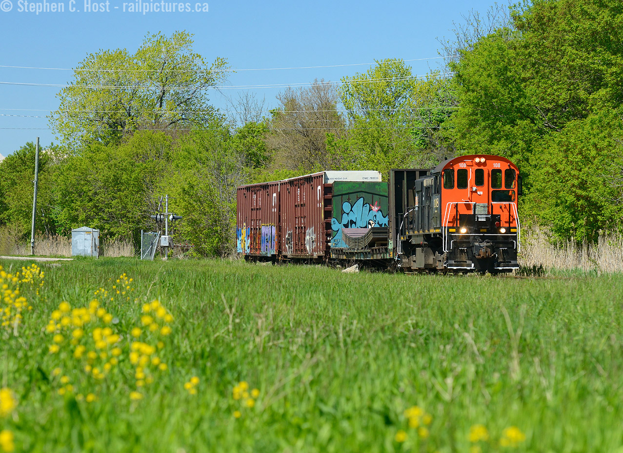 60 or so  years ago this was the Niagara, St Catharines and Toronto mainline - and interurban electrics and electric Freight motors would ply this mainline track at 50 MPH as this was the 'high speed' N&ST mainline. The N&ST was an amalgamation of steam built rights of way, electrified for interurban service, with some Streetcar franchises (as local feeders to the interurban lines) from Niagara Falls, St Catherines, Port Weller/Dalousie and down to Welland/Port Colborne. After the amalgamation, the Toronto portion of the N&ST was a ferry service over Lake Ontario, the railway never actually connected to Toronto directly. Sale to the Canadian Northern which became CN in 1922 brought us to the N&ST as one of CN's few "electric lines". While a good chunk of the &NST does not survive, the fact a large portion of it does is a testament to the railway builders who envisioned the transportation network in the 19th century.If any readers have N&ST electric photos (even after disposition - the N&ST motors did go everywhere!) they would be most welcome - we have zero that I can tell!
Trillium once operated a tourist service (Geoff Elliott Photo)  over this line 15 or so years ago, but it's a turkey trail now, all of 10-15 MPH. Trillium recently proposed bringing commuter services back.. contingent on funding, but if I was a betting man... I'd stare at Geoff's photo instead :)