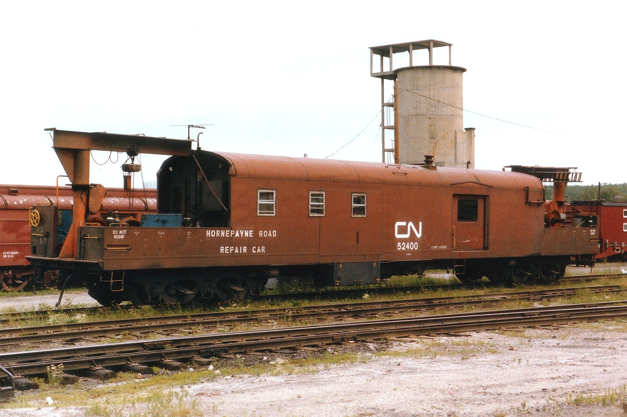 Here is an all-purpose necessity of the North.  The repair car. This unit is one of a handful of such MoW vehicles still operating in the outbacks of Ontario. Interesting relic. :o)