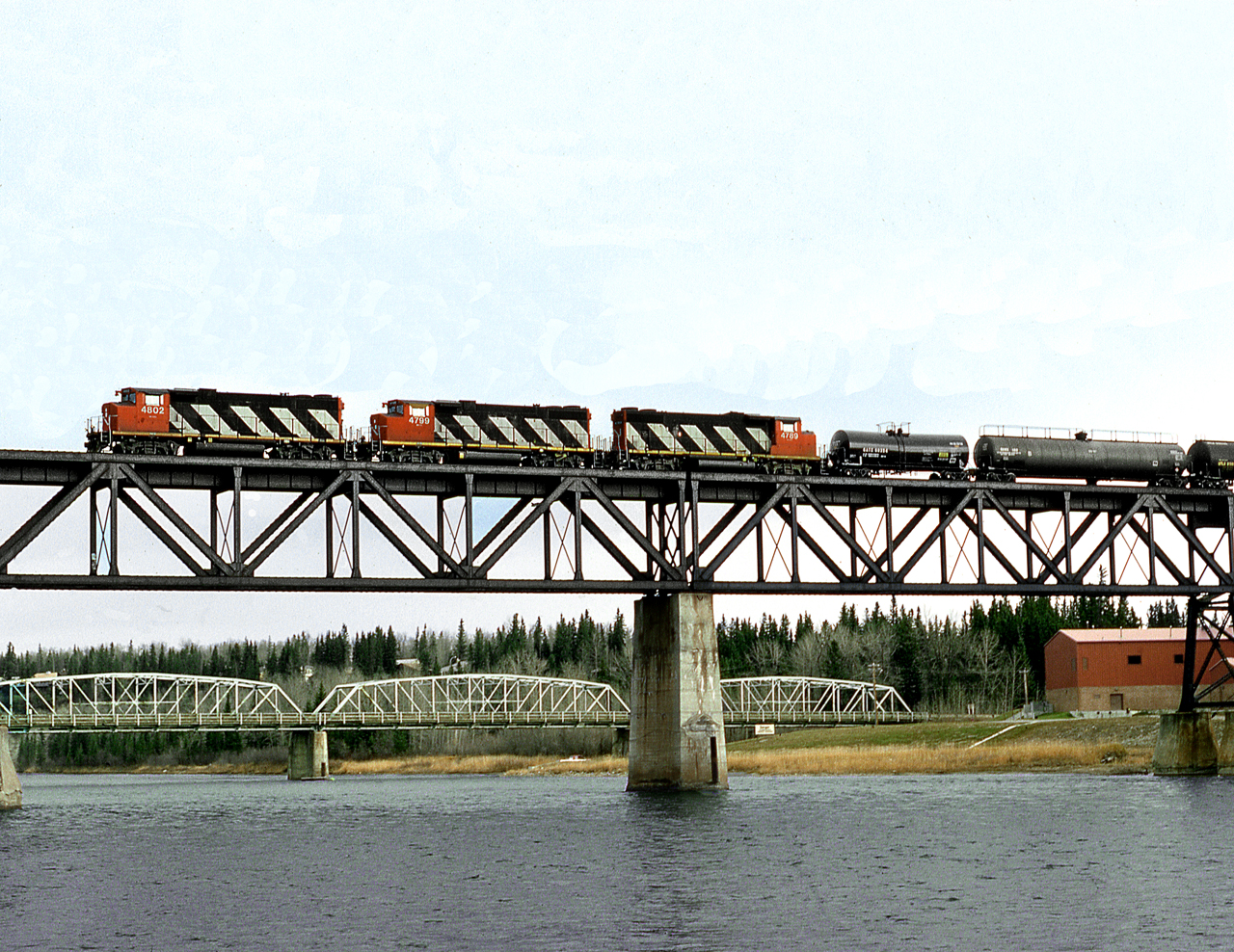 CN's Red Deer based wayfreight crosses the North Saskatchewan River at Rocky Mountain House to switch the Ullin gas plant on the west side of the river.