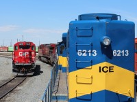 Another sold SD40-2, ICE 6213 provides some colour variation to the red SD30ECO #5028 that's awaiting inspection space in the shop.