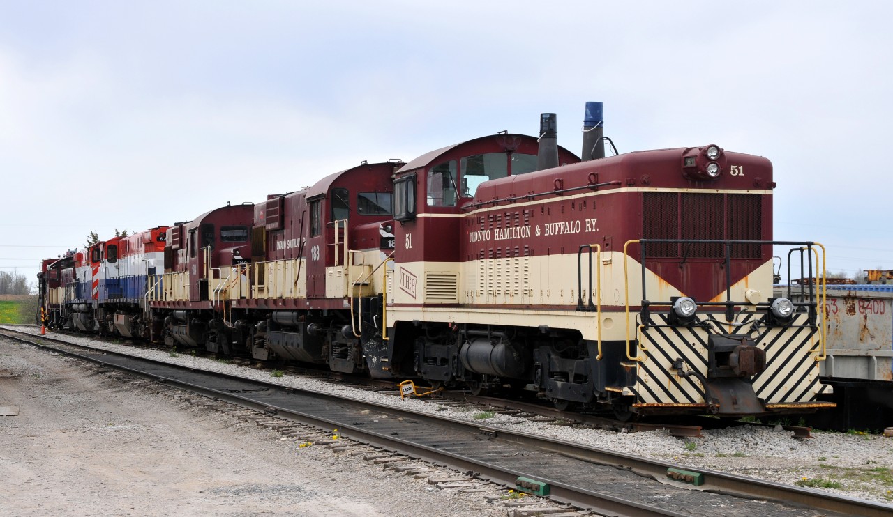 Former TH&B 51 heads up the impressive dead/storage line at Salford consisting of  RS18's, M420W's, an S-6, and 1927 (re)built CP wedge plow #401005