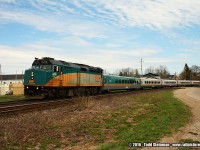 This photo is for the record books.
<br>
Upon arriving in Paris on a beautiful Sunday afternoon, I checked the signals as I was going over the crossing at Market Street. Signal was green on the north track, and I turned the car around as I was  originally planning to head to Ayr. As I was doing a three point turn, the signals lit up, and it was train time.
<br>
Thankfully my family was with me as my wife handed me the camera quickly. All I had was basically seconds to turn the camera on, get out of the car quickly, and this was my resulting shot. In fact, it was my only shot. Via 6416 with train 73 accelerating out of Paris.
<br>
Sometimes being a father and a husband, sacrifices need to be made. This goes down as my shortest rail fan trip of my life...<b>EVER!!!</b>