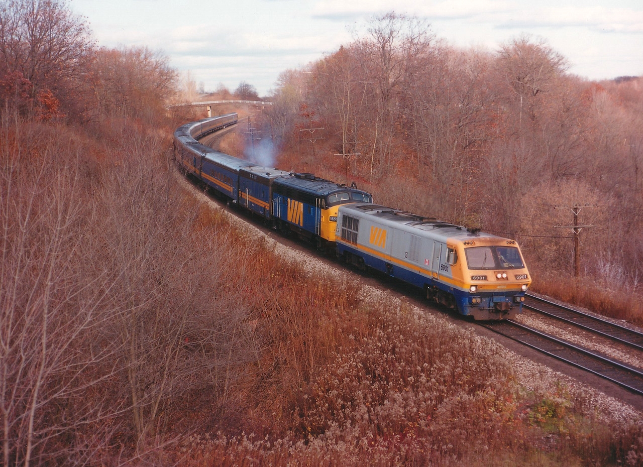 This was a nice treat on a nice day because this combination was very uncommon. The BBD leader and its family didn't last much over twenty years, (1980-1 to 2001-2)and it seemed they were just getting accepted by the railfan community and they were being retired. They were nowhere near as popular as the FP9 cab unit, the example in this photo being trailing unit 6518 on this mid-day train.