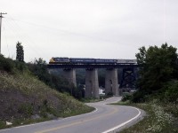 CSX GP40-2 6249 leads the management special out of St Thomas west ward, on the Caso sub. Seen here crossing the Kettle Creek viaduct. I believe this bridge is now part of the trans Canada trail and is a pedestrian walkway. 