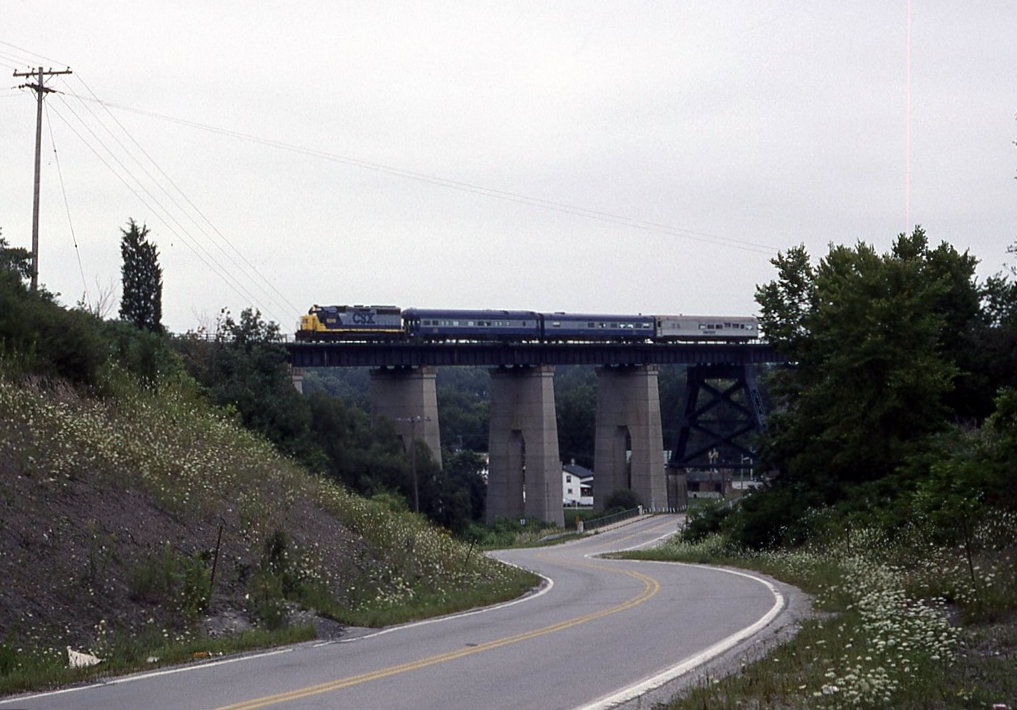 CSX GP40-2 6249 leads the management special out of St Thomas west ward, on the Caso sub. Seen here crossing the Kettle Creek viaduct. I believe this bridge is now part of the trans Canada trail and is a pedestrian walkway.
