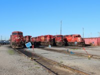 Various GE AC4400's built from 1997-98 keep lone (still running and used for making shop moves) SD40-2 6050built in 1983 and still in original paint. This is the view facing west from the diesel shop.