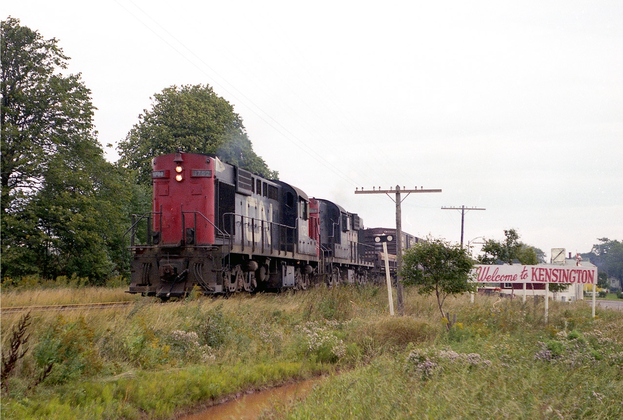 Almost nothing left on the "gentle island" but memories these days.......but even back in the day rail traffic was sporadic. After all, with only 140,000 people on the whole island/province, how much activity could there be?  I was lucky to catch a local working Kensington. CN 1752 and 1751, a pair of RSC-18s, were just heading out of town toward Summerside, if I recall correctly, was I was heading in. The Sidekick and I were meeting friends for dinner, otherwise I would have gladly followed this train around longer than the half hour I did. All rail activity on the Island was gone by 1990; but this province is still a great place to visit, and besides, there is a solitary locomotive on display in Kensington still, CN 1762, as well as a beautiful stone station. (the map location is probably a bit off; no rail left to help with "X" marks the spot.)