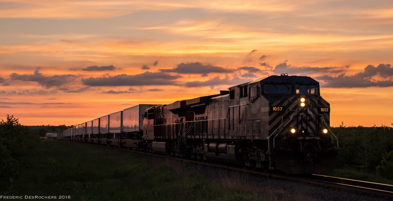 Minutes after sundown, a rather full 132 blasts through Bowmanville en route to Montreal. 

CEFX 1057 & CP 8910