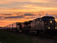 Minutes after sundown, a rather full 132 blasts through Bowmanville en route to Montreal. 

CEFX 1057 & CP 8910