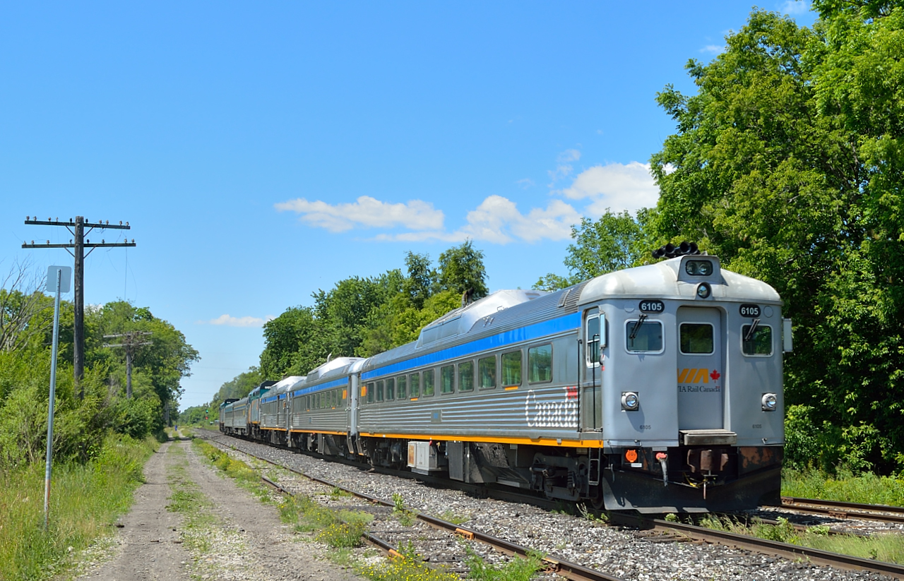 An extended VIA 85 hurtles past me at mile 50 GEXR Guelph Sub.  Today's consist was VIA F40PH-3 6446, the usual 2 HEP cars, then F40PH-3 6401, RDC-4 6251, RDC-2 6208, and RDC-1 6105.  The RDC's were making a test run on the Guelph Sub for a second time.  On June 18, 2016 they were to test from Sarnia to Chatham, ON.  The RDC's made this first test run in late February, as seen here: www.railpictures.ca/?attachment_id=23298