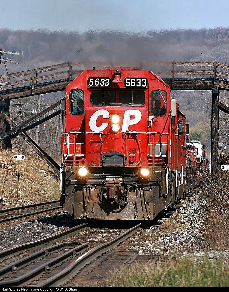 Leading the charge up the Niagara Escarpment approaching Campbellville this SD40-2 was 35 years old at the time of this shot. One has to wonder what its fate was. Did it get sold to a shortline somewhere or end up as a new washing machine?