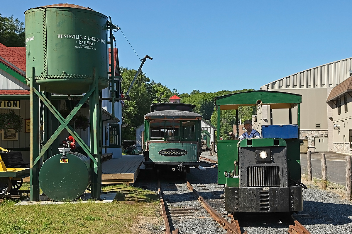 While the steamer heats up in the train shed Greg runs the little Brookville around the coaches to take a spin down the line for a track inspection and to open up the Fairy Lake Station at the far end in preparation for the day's runs.