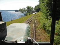 Taking the little Brookville switcher for a spin down the line to inspect the tracks and open up Fairy Lake Station in preparation for the day's runs.