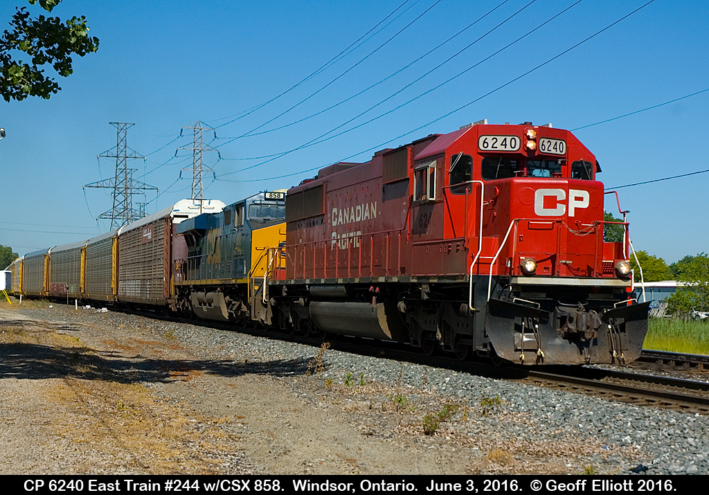CP train #244 gets rolling away from Dougal Ave., in Windsor, Ontario on June 3rd, 2016 with CP 6240 on point with CSX ES44AC-H #858 bringing up the rear.  At least they put the good power on the point!!  :-)