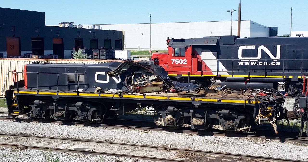 Don't try this at home! A very badly damaged TEBU4 sits at Mac Yard LRC. This unit has been here for over 1 year and will likely not be repaired any time soon. This might be an interesting unit to model as iut started out life as a GP9.