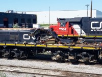 Don't try this at home! A very badly damaged TEBU4 sits at Mac Yard LRC. This unit has been here for over 1 year and will likely not be repaired any time soon. This might be an interesting unit to model as iut started out life as a GP9.