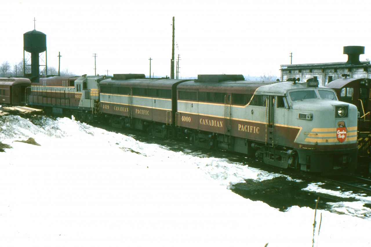 On a dull March 9,1965, power in the yard at Mactier includes 4000-4419-8911 and an SW1200. The Trainmaster is somewhat unusual. A few of them came east each winter in the 60s to help with the grain rush and they were often used in transfer service around Toronto.