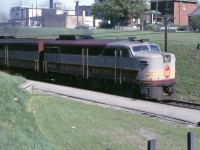 FA-1 4002 leads 903's train and has just passed under Simcoe Street, Oshawa in May 1965. The Oshawa Dairy plant can be seen in the top of the photo. It was taken over by one of the big milk companies and torn down a few years later.